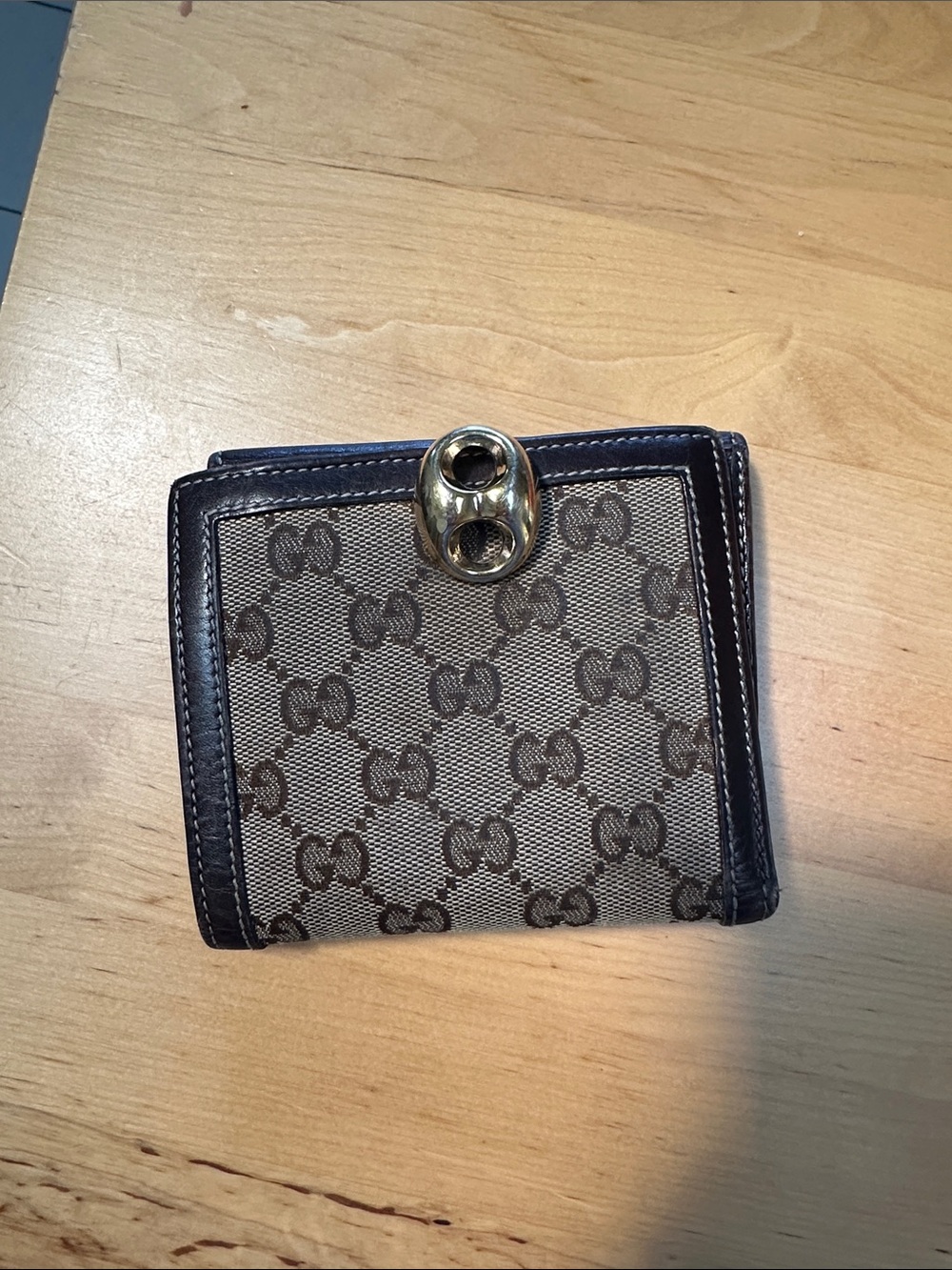 Gucci Brown Monogram Canvas Wallet with Gold-Tone Closure